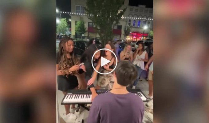 A woman interrupted a street musician's performance and then stole his money.