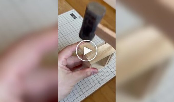 A wooden toothpick dispenser