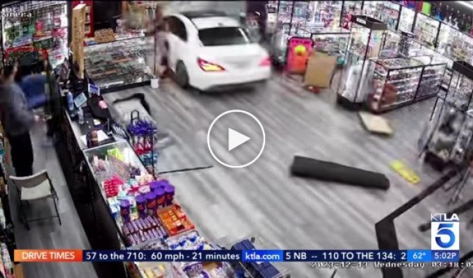 A drunk car driver crashes into a store building
