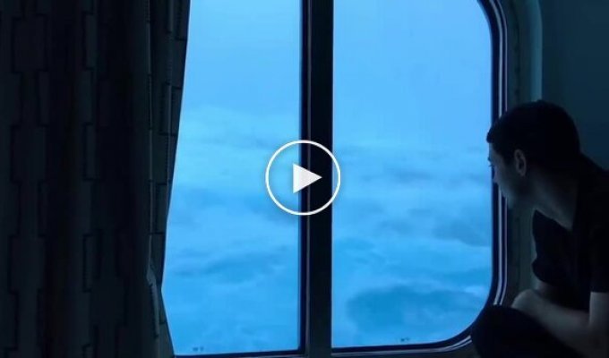 A view from a cabin on the third deck of the cruise liner Hymn of the Seas during a storm