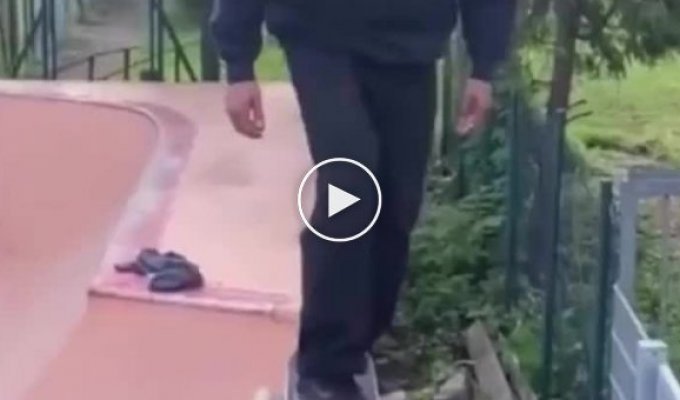 Skate park foreman shows a trick