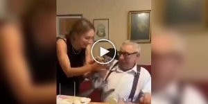 A grandfather could not resist the charm of a kitten